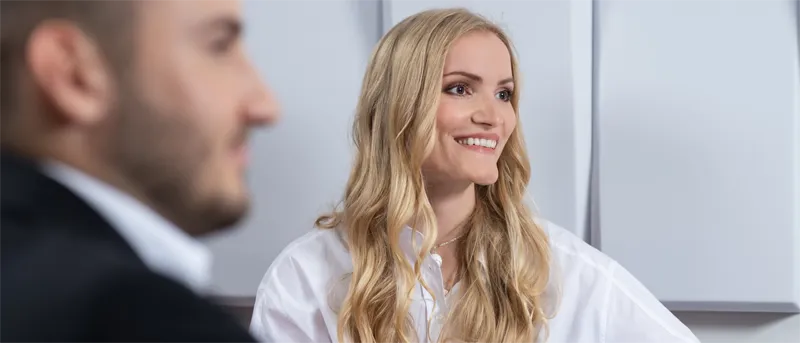 two employees listening